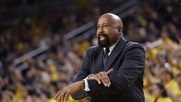 Coach Mike Woodson reacts during the first half against the Michigan Wolverines at Crisler Center.